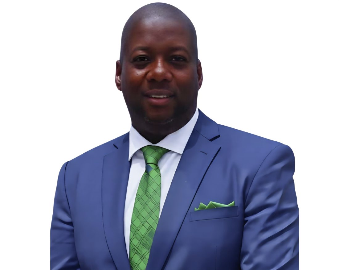 Bernard Jackson Jr., REALTOR®, in a blue suit and green tie